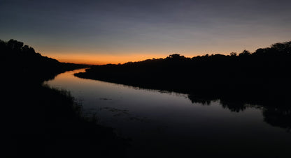 L1010 Sunset over the Thamalakane River, Maun, Botswana
